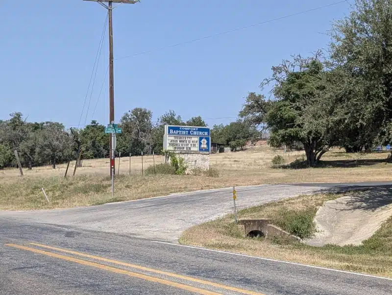Comfort Baptist Church roadside sign at the church property in Comfort, Texas
